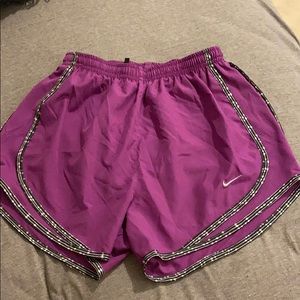 Purple Nike shorts